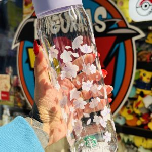 –         STARBUCKS SAKURA 2025 BOTELLA CON TAPA DE MANGO 710ML + LUCKY BAG