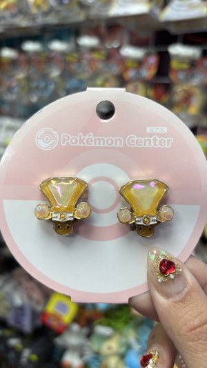 THEVOLTAGE.CL POKEMON CENTER ACCESORIOS AROS TERACRYSTAL EEVEE