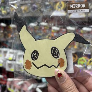 THEVOLTAGE.CL POKEMON CENTER ACCESORIOS ESPEJO DE MANO MIMIKYU