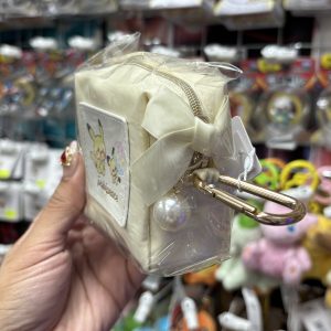 THEVOLTAGE.CL POKEMON CENTER ACCESORIOS MONEDERO SATÍN