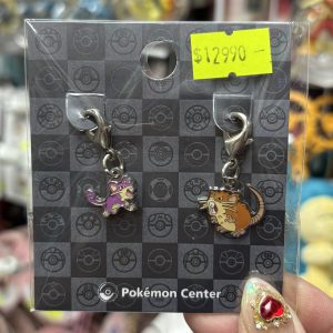 THEVOLTAGE.CL POKEMON CENTER ACCESORIOS DIJE DOBLE