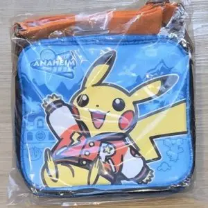 THEVOLTAGE.CL POKEMON CENTER ACCESORIOS BOLSO PORTA PINES ANAHEIM